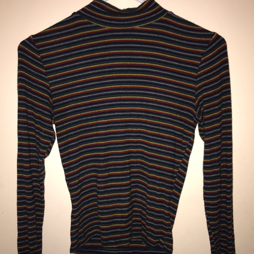 Rainbow striped turtleneck from Garage